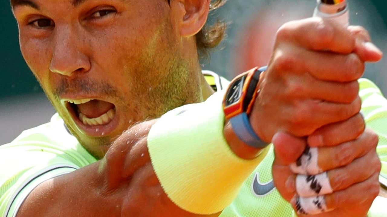 Federer can't handle wind or Nadal in 3-set French Open loss